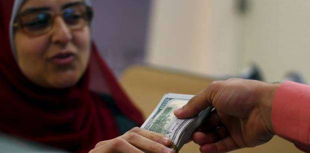Egypt's illicit currency traders defy crackdown, spread business abroad