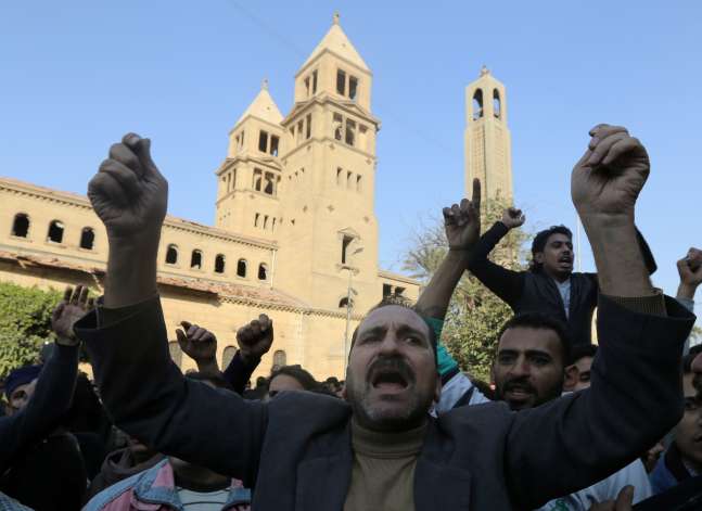Dozens protest outside Coptic Cathedral following explosion