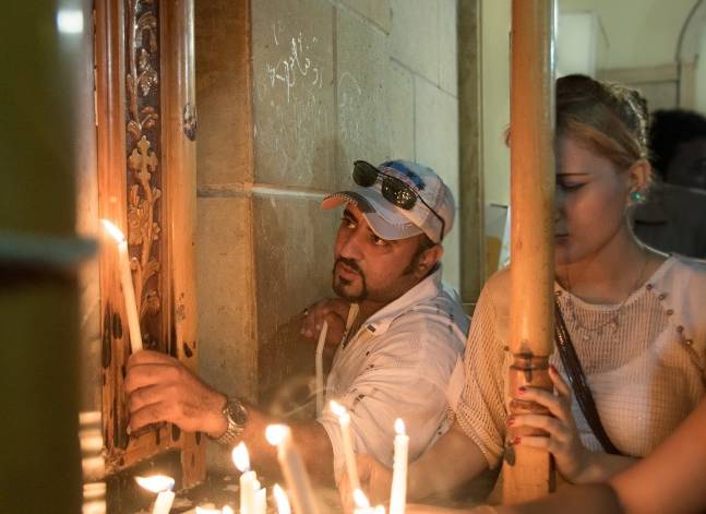 Coptic Christians celebrate the birth of the Virgin Mary at a church in Eastern Cairo.