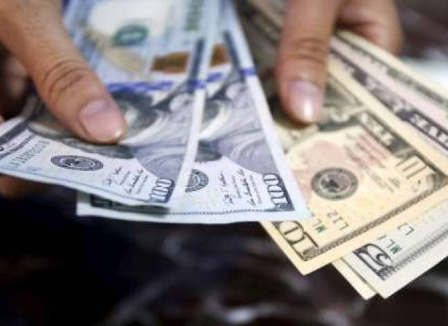 Egyptian pound trades around 18 per dollar in banks