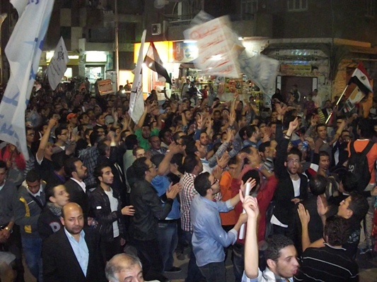 Thousands mourn Assiut deaths, chanting against Mursi