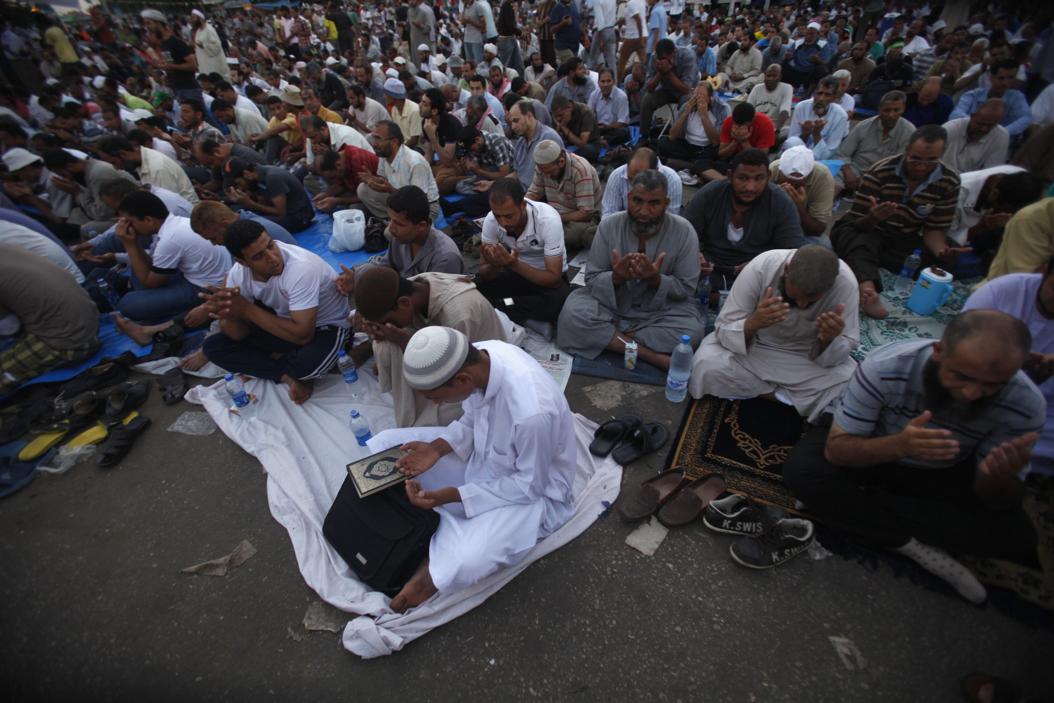 Police raid pro-Rabaa conference in Cairo, hold attendees