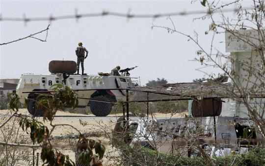 UPDATE 1-Israeli soldier, 3 gunmen killed on Israel-Egypt border