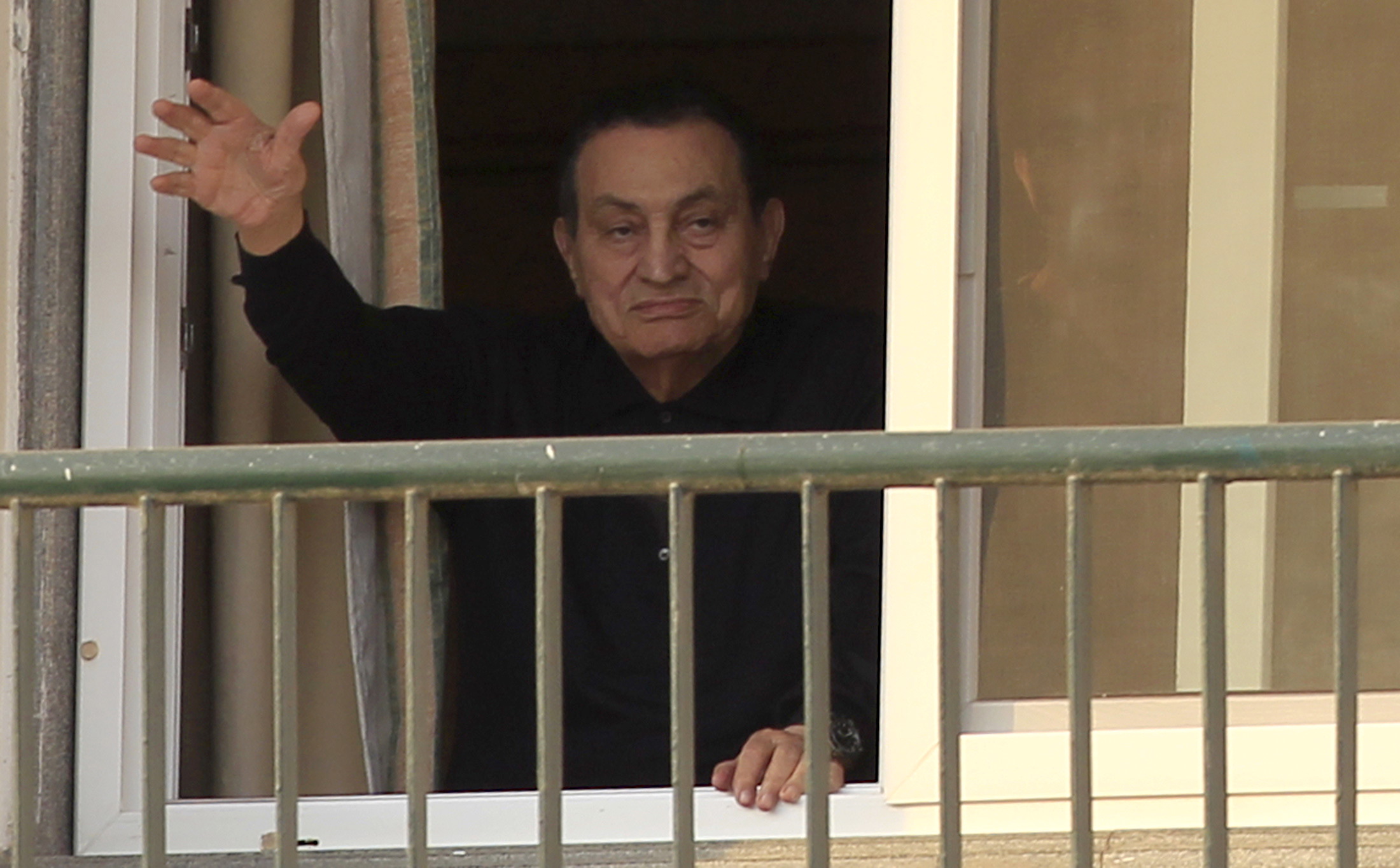Court sentences Mubarak and sons to three years of maximum security prison