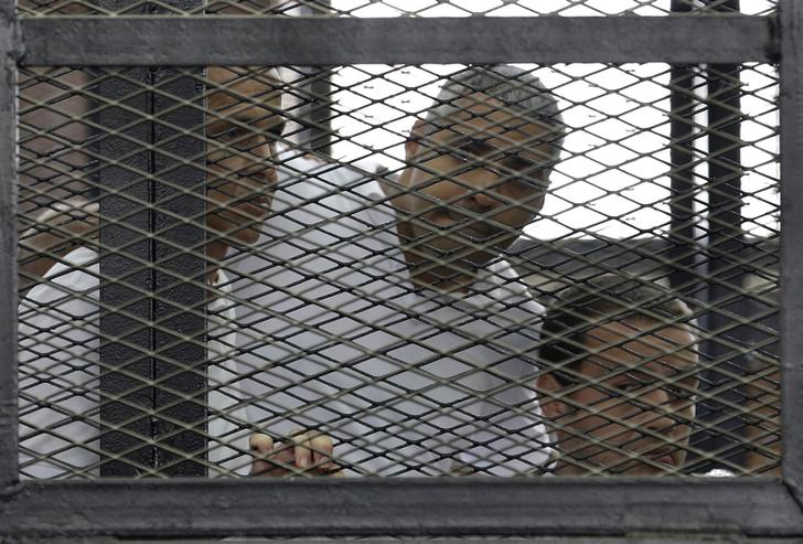 Two jailed Jazeera journalists seek deportation from Egypt