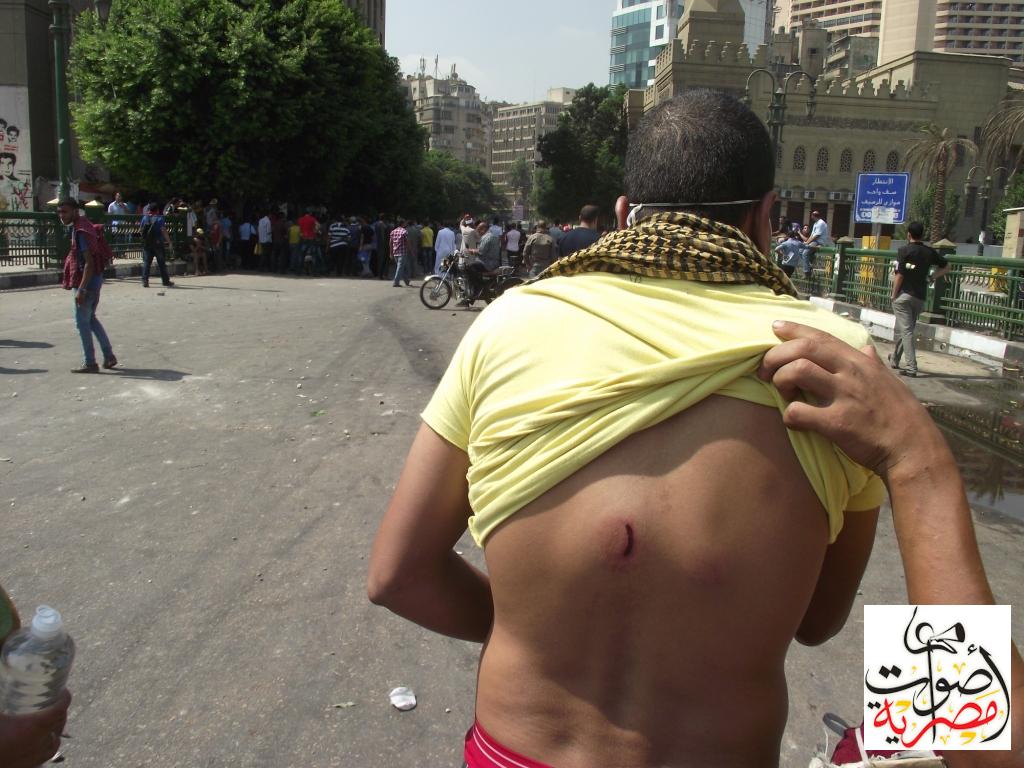 Egypt's Mursi condemns embassy attack, protesters clash