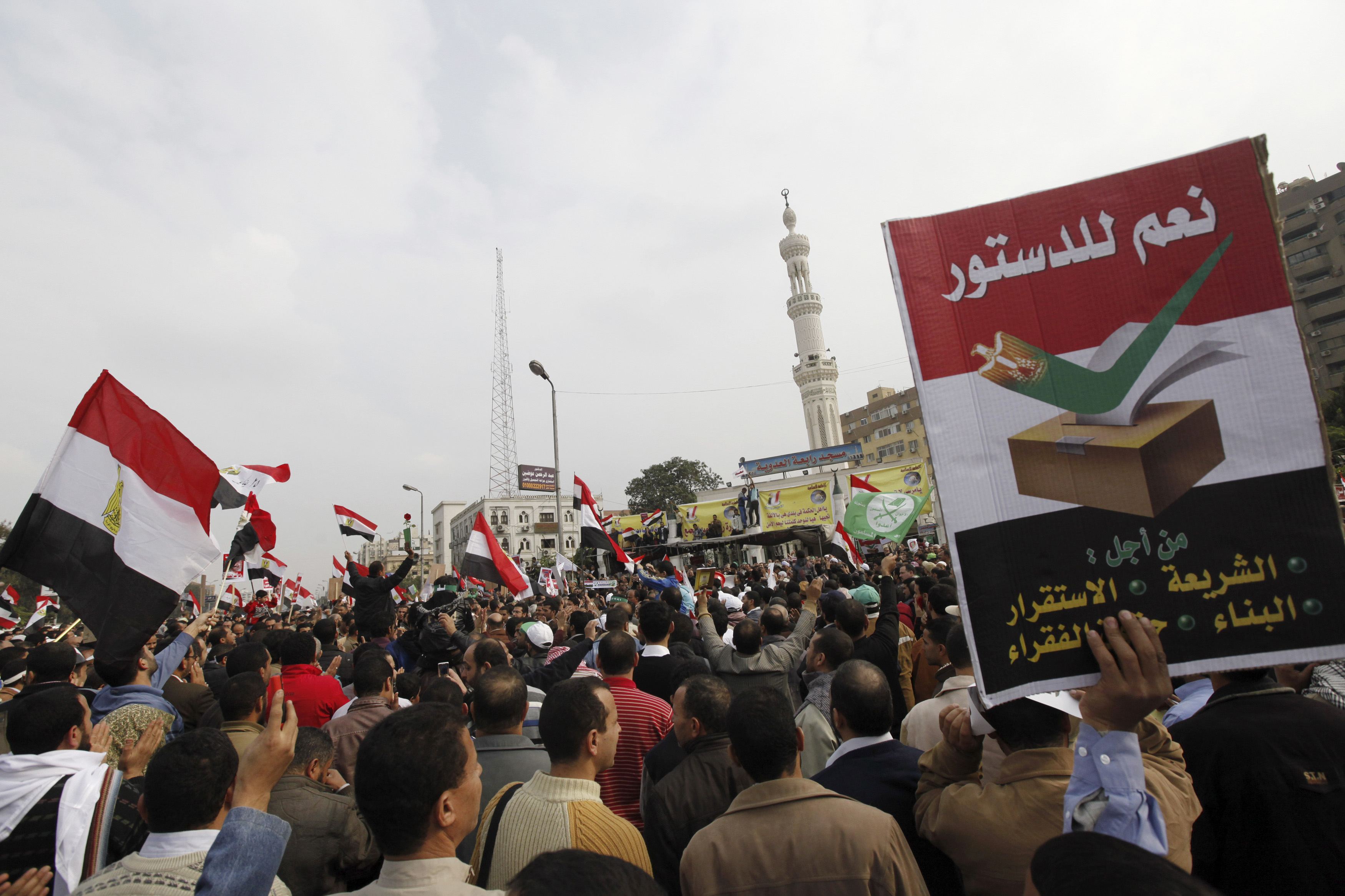 Pro-Mursi demonstrators at Nahda Square demand his return