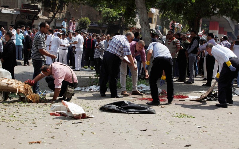 Police officer killed, three injured in blast outside Giza police station – health ministry
