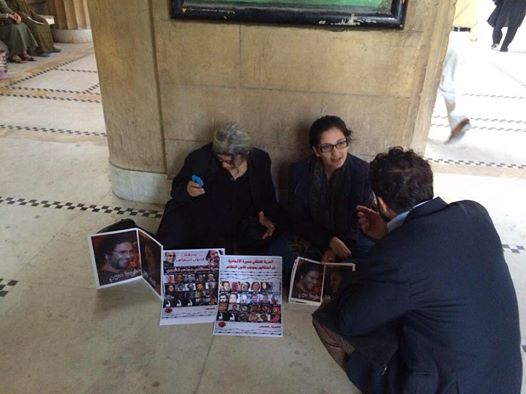 Two activists begin sit-in to protest jailing their family