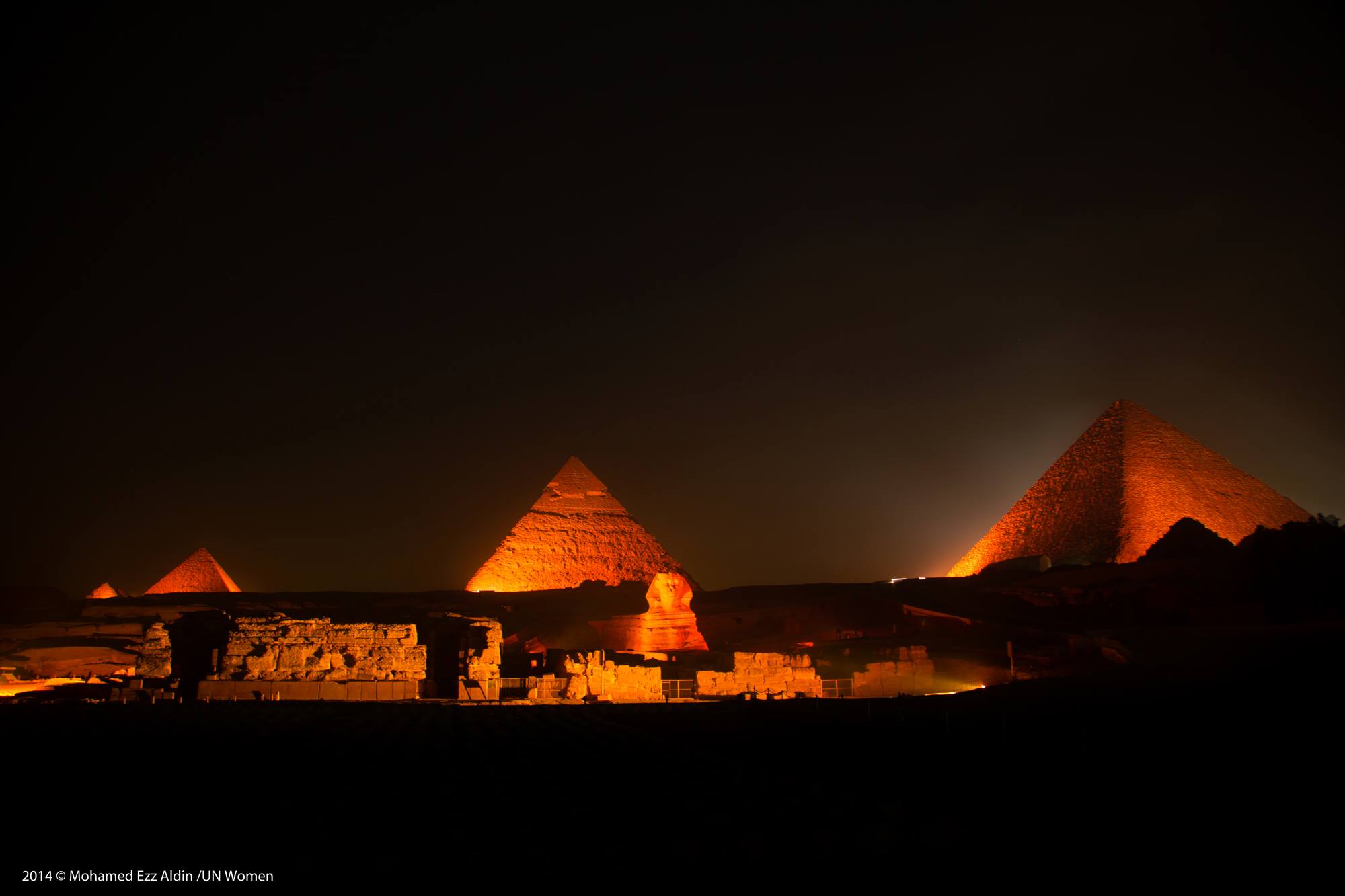 Egypt's pyramids and sphinx shine in orange to end GBV