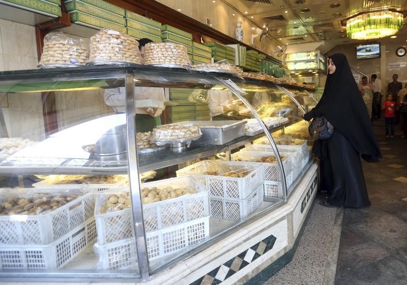 Egypt's Qalaa considers sale of food businesses, sees 2015 profit