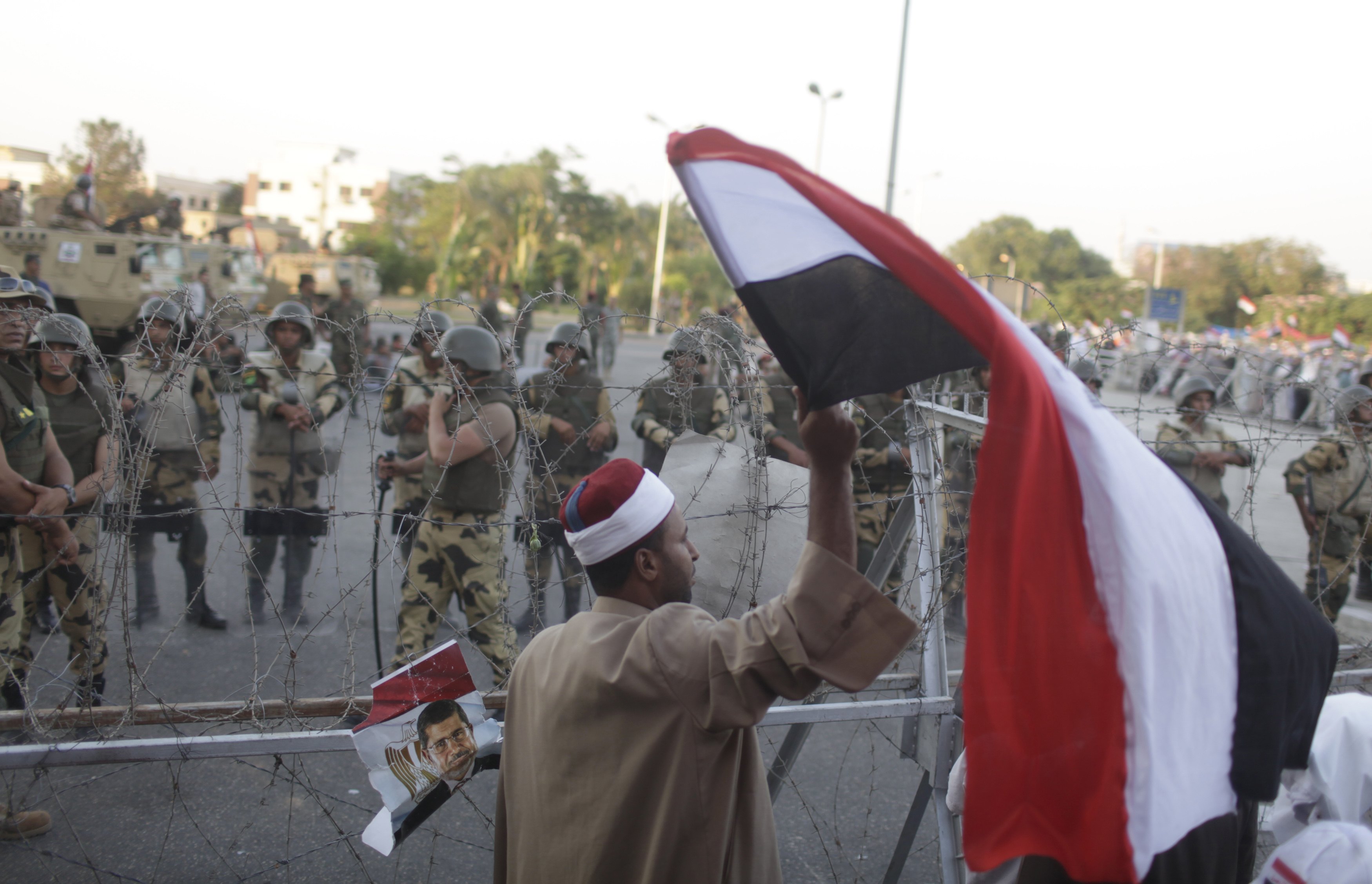 Muslim Brotherhood says army chief wants Syria's fate for Egypt