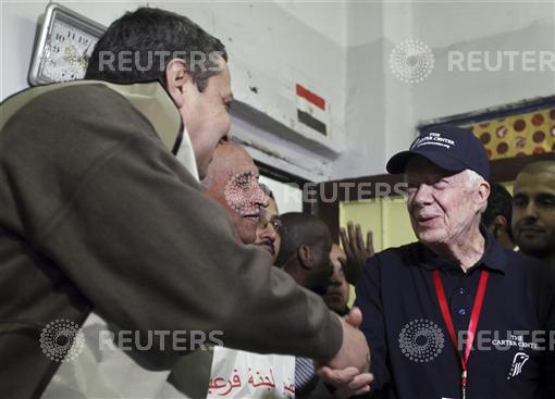 Jimmy Carter visits polling centres to check voting process