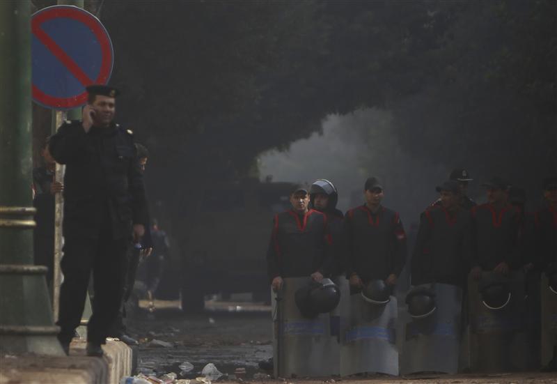 Egypt police storm area near Cairo, one killed