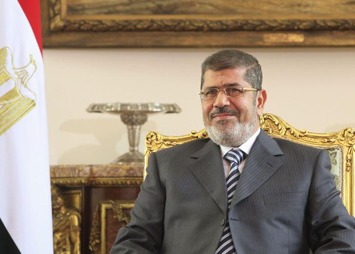 Mursi cuts Egypt's Syria ties, backs no-fly zone