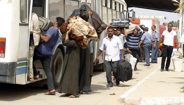 عودة 560 مصريا من ليبيا على متن طائرتين من مطار جربا التونسي اليوم