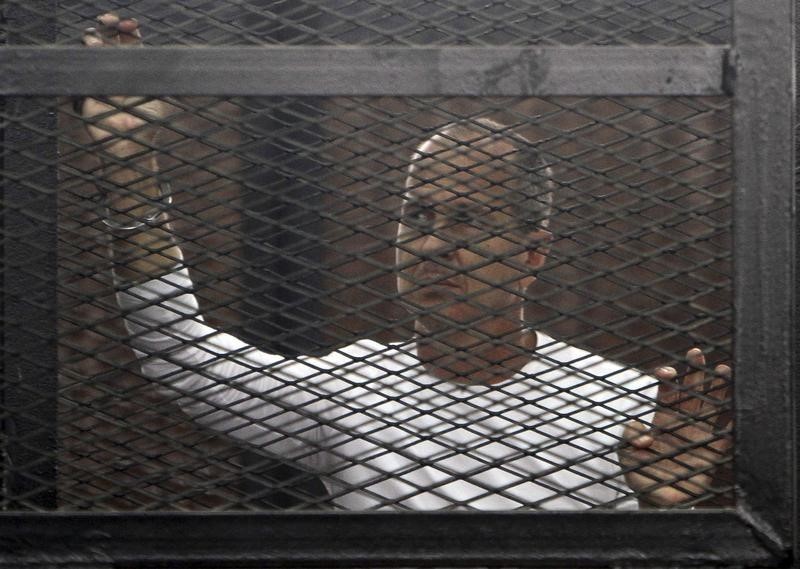 صحفي استرالي مسجون يطالب بترحيله من مصر