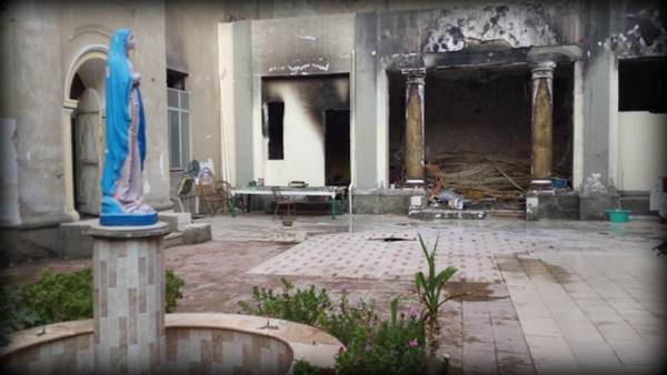 بالصور والفيديو: بعد عام من فض رابعة والنهضة.. زيارة جديدة للأماكن القبطية التي أحرقت في السويس